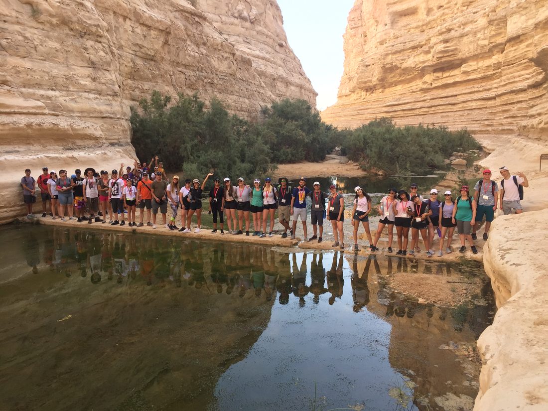 A Birthright group on a guided desert hike at Ein Avdat in the Negev
