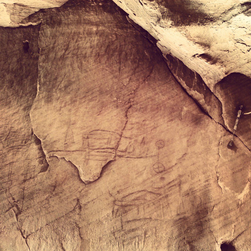 Ancient hunting scene etched in the rock at Timna