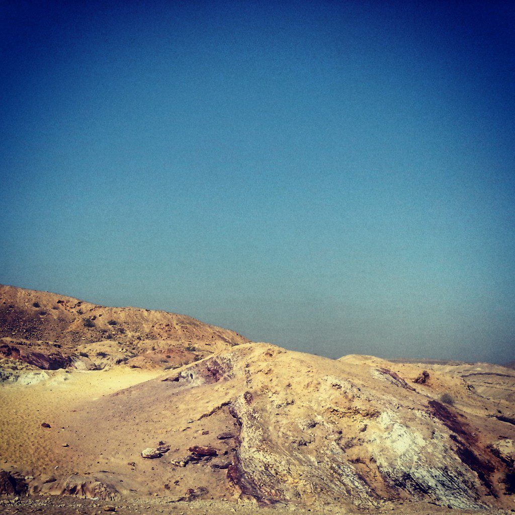 Coloured mineral rock strata on a Negev hillside