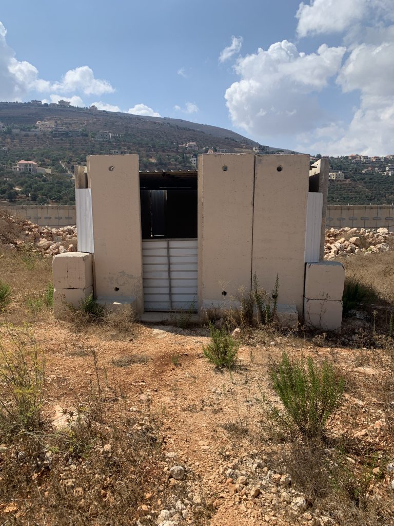 The blocked-up entrance to a tunnel that Hizbollah dug under the Israel-Lebanon border (the border is in the background) with the objective of conducting terror attacks within Israel.