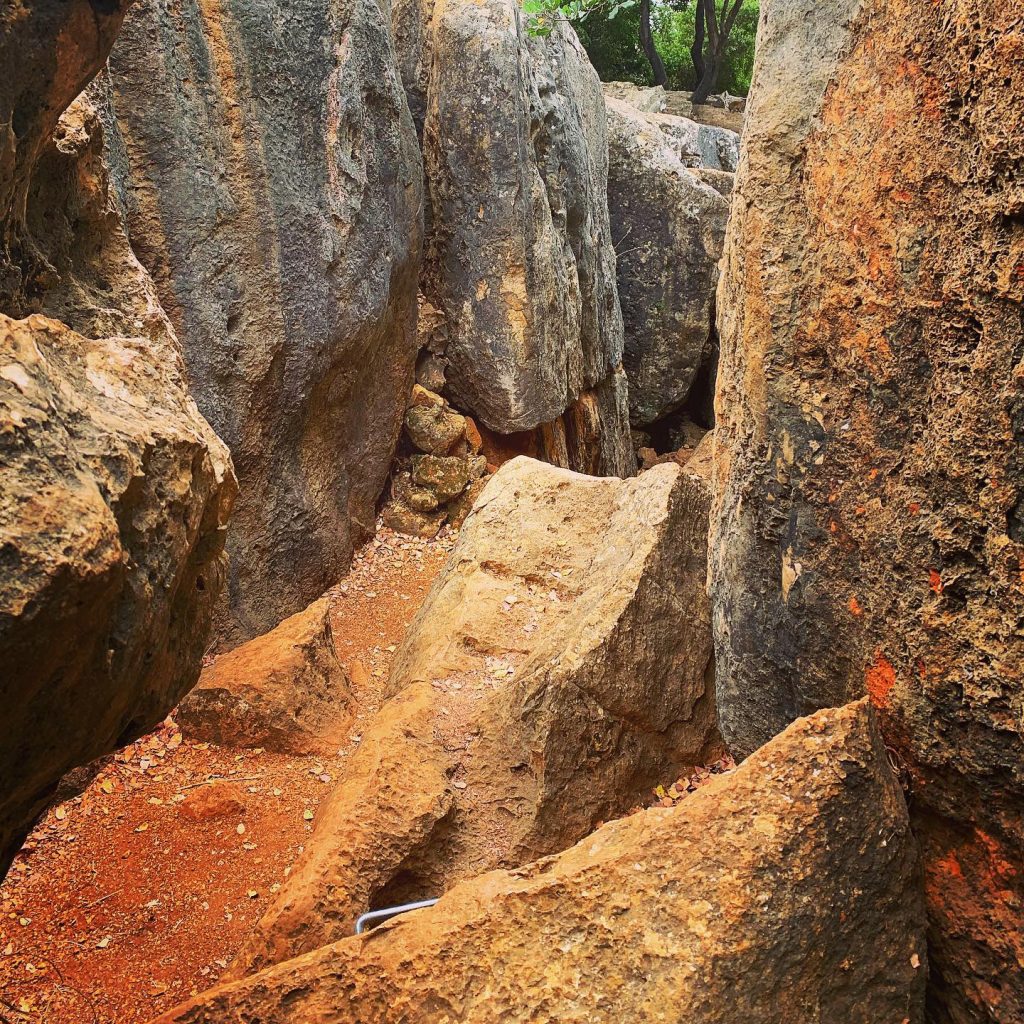 Clambering through the Yiftach Crevices in Israel's Upper Galilee with the help of iron handholds
