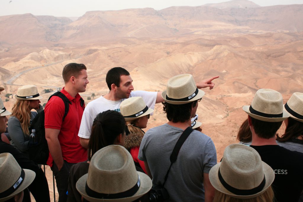 Samuel guiding a group in the Judean desert