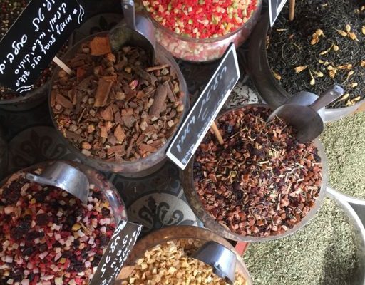 Colourful spice and dried-fruit blends at an Israeli market stall
